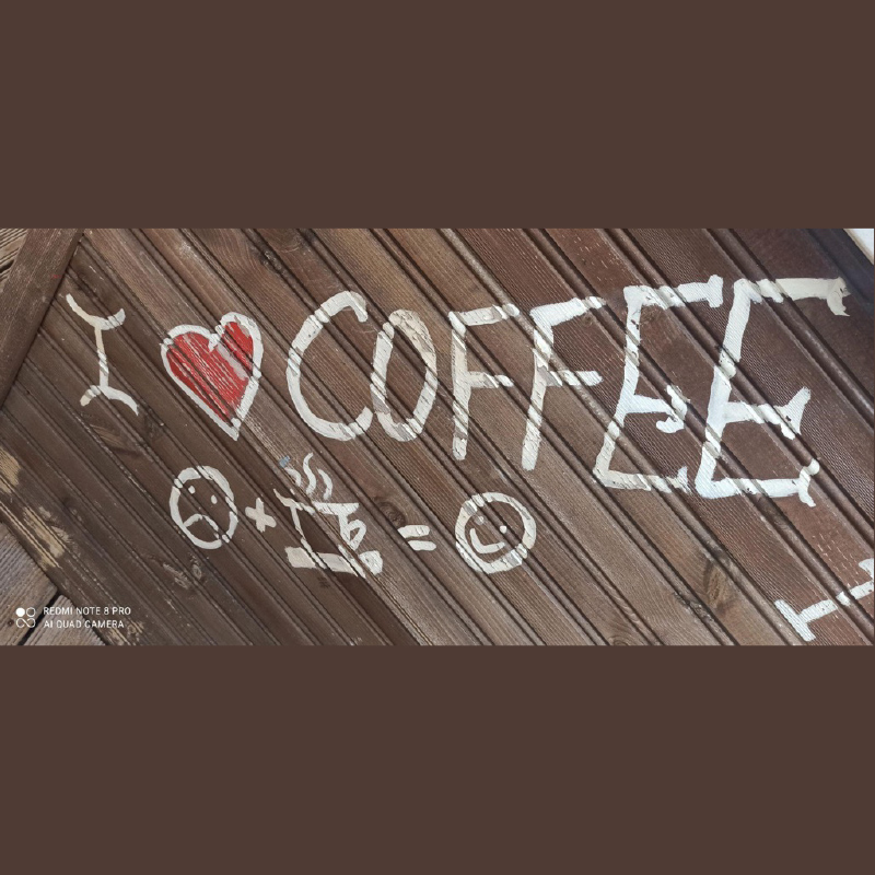 Scritta "Io amo il caffé"